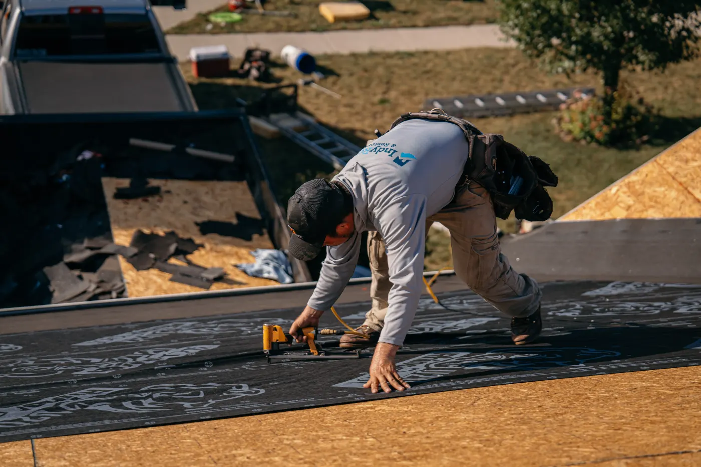 Tarping and dry-in on a Oak Manor commercial roof